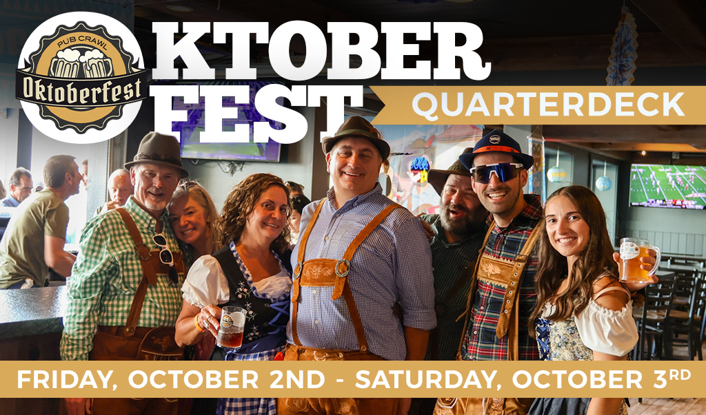 Group in lederhosen celebrating Oktoberfest at bar